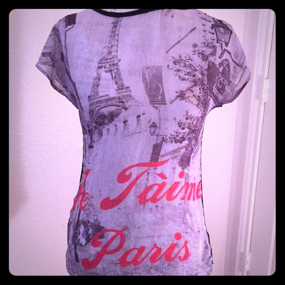 Beautiful sheer blouse two toned front graphic.